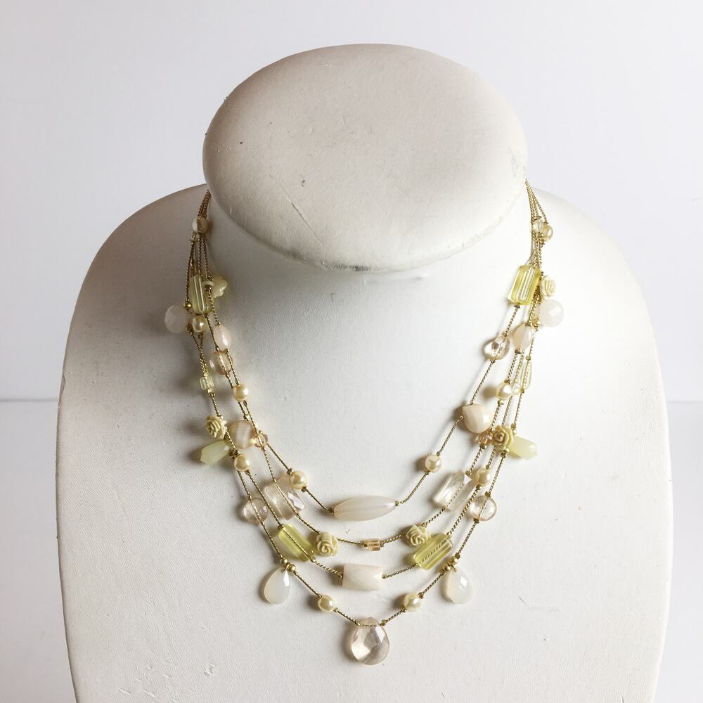 Vintage multistrand gold brass beaded necklace with resin rosettes roses